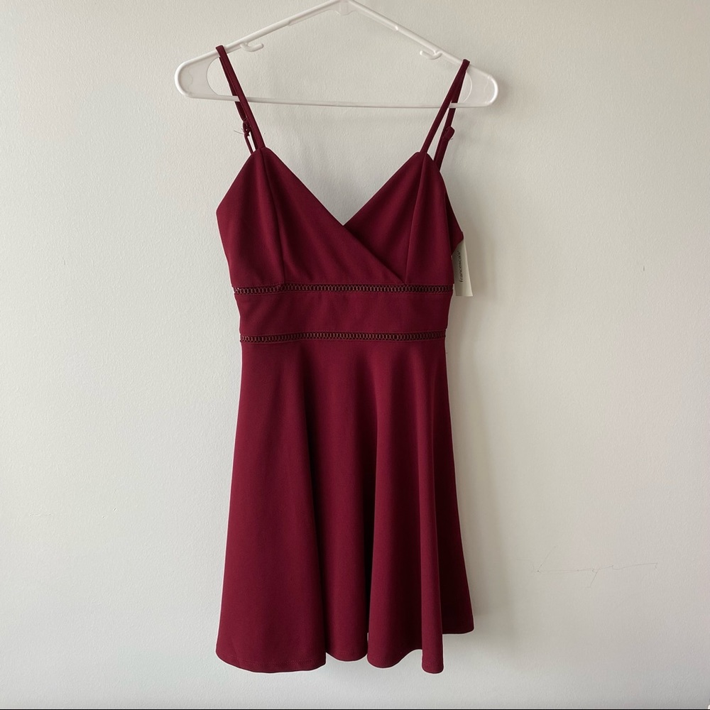 Francesca’s maroon mini v-neck ladder waisted dress. NWT.